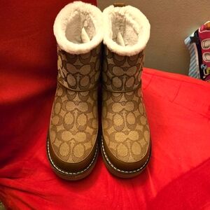 Gently used AUTHENTIC Coach boots